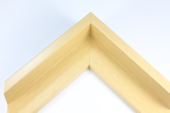 This L-shaped canvas floater frame features a natural finish, with a 1-1/2" depth for artworks.

*Note: These solid wood, custom canvas floaters are for stretched canvas prints and paintings, and raised wood panels.