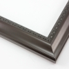 This shallow reverse scoop frame features a smooth face in a dark walnut wash with a subtle view of the natural wood grain. The inner lip is a horseshoe relief design in black, and the outer edge has a slight bevel.

1.5 " width: ideal for medium size artwork.  The simple elegance of this frame makes it the perfect border for photographs, paintings and giclee prints.